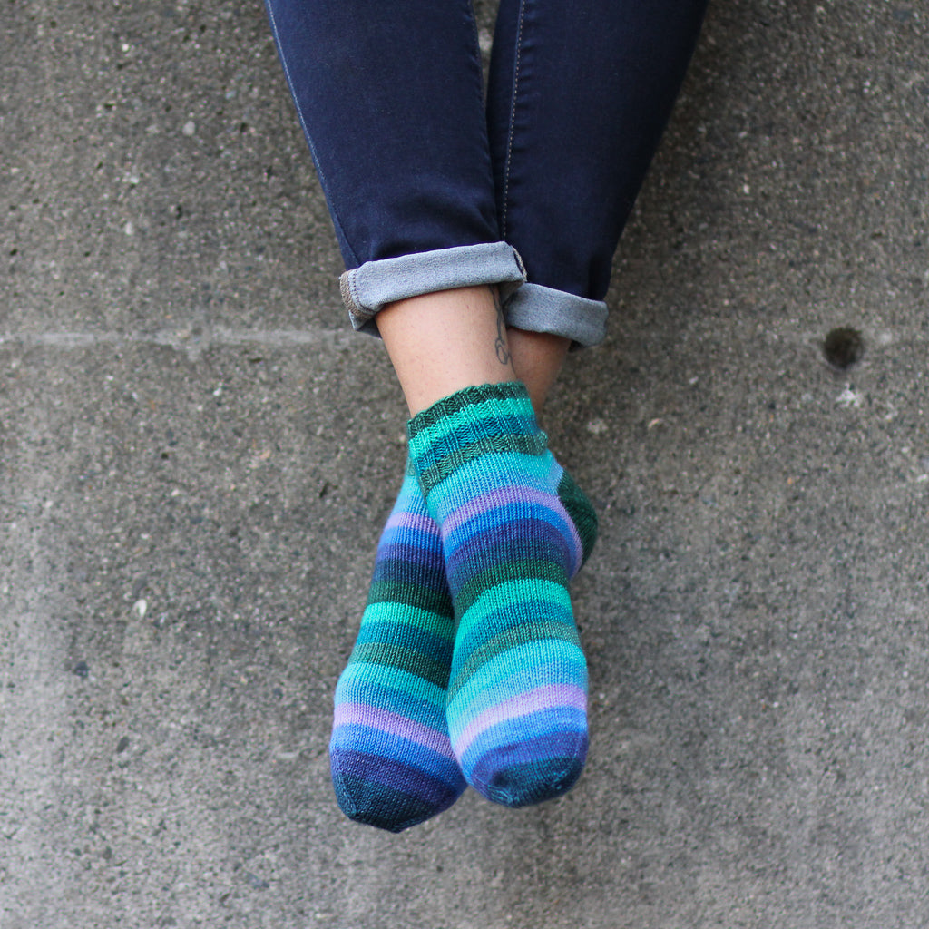 Azurite F green and purple self striping classic sock yarn from gauge dye works