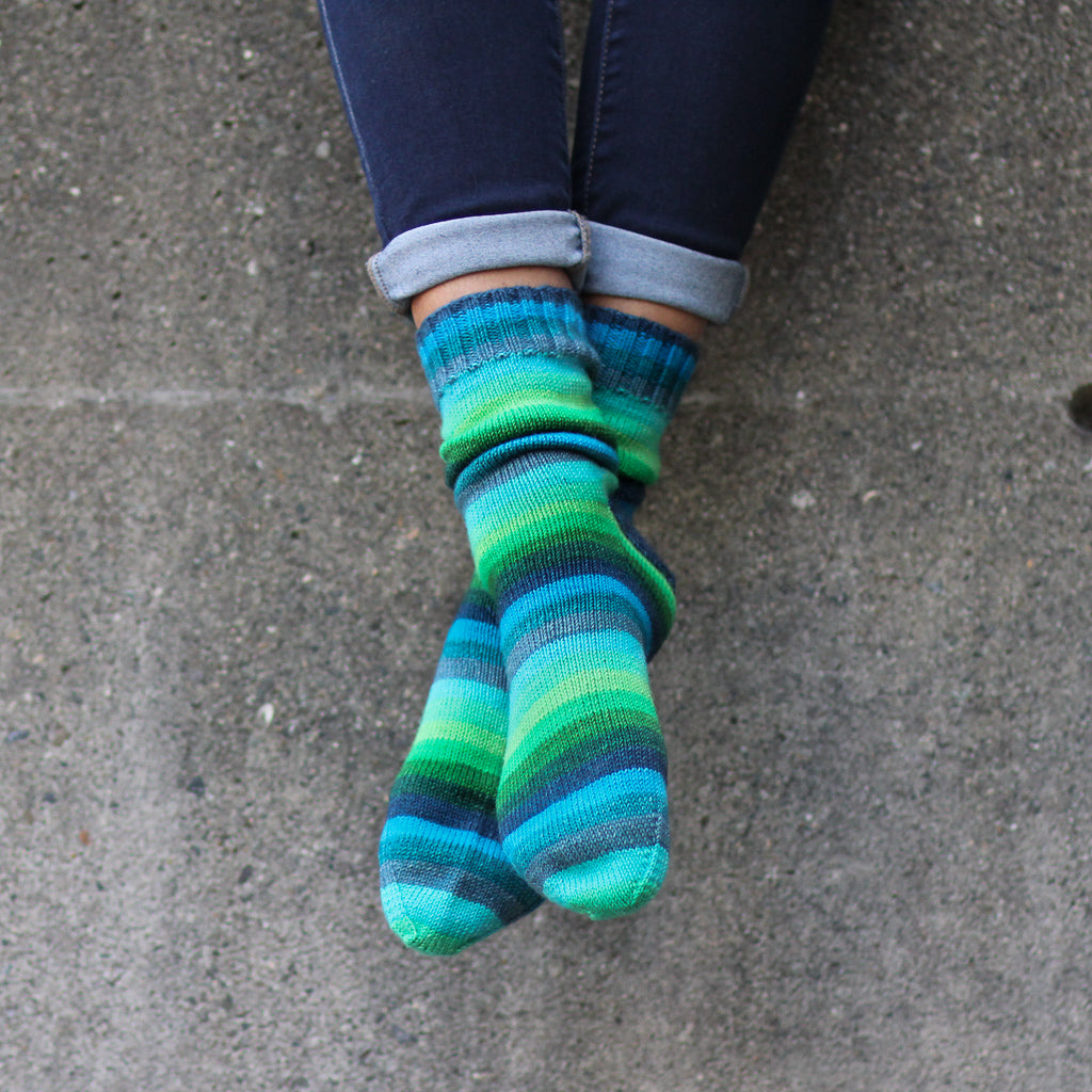 Azurite A self-striping green and blue sock knitting yarn from Gauge Dye Works