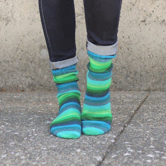 Azurite A self-striping green and blue sock knitting yarn from Gauge Dye Works