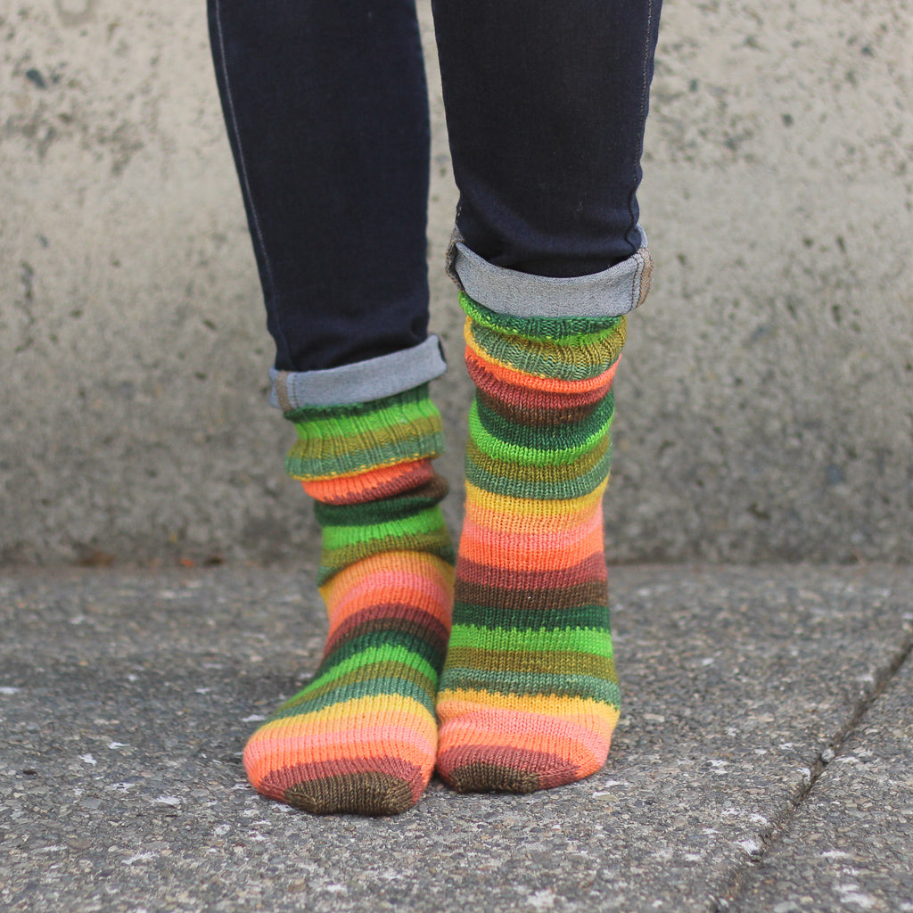 Azurite B classic orange and green self striping sock yarn from gauge dye works