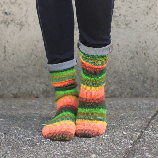 Azurite B classic orange and green self striping sock yarn from gauge dye works