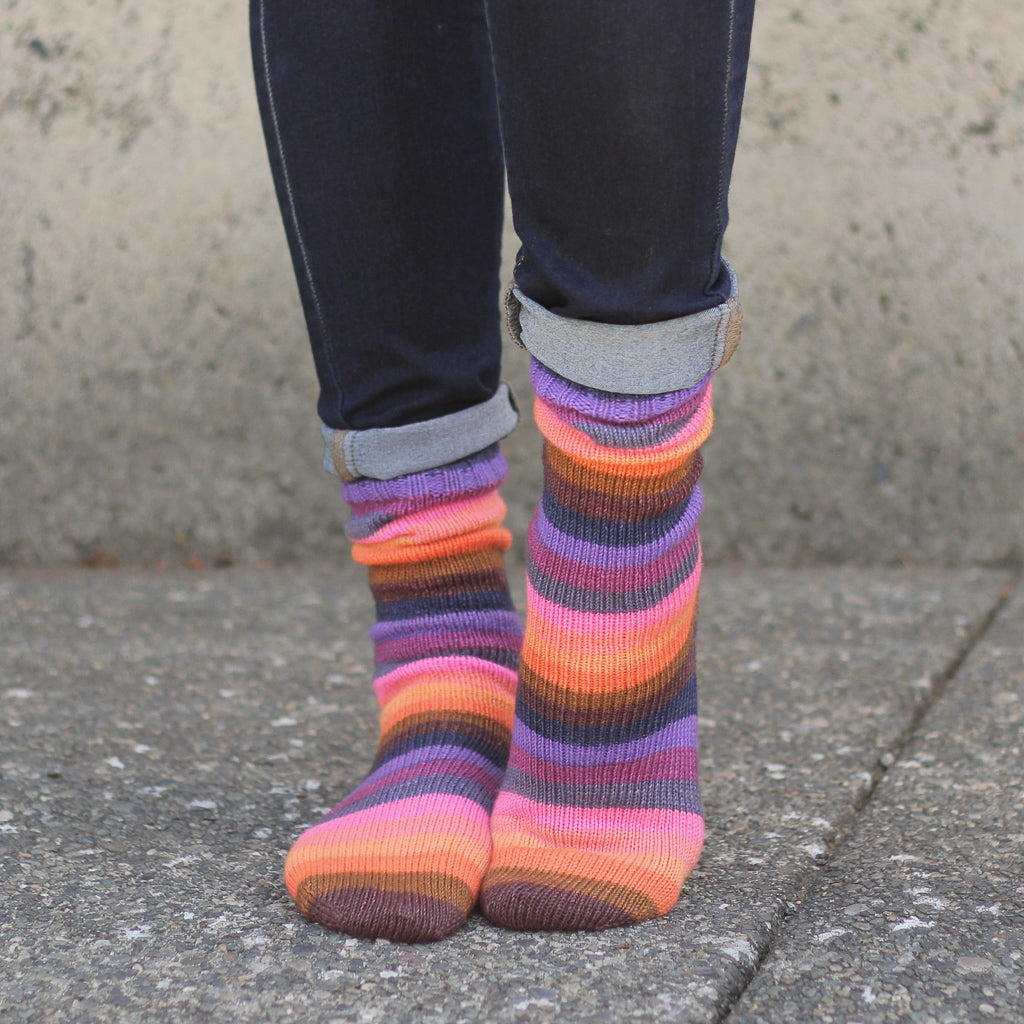 Azurite D orange and purple self striping classic sock yarn from gauge dye works