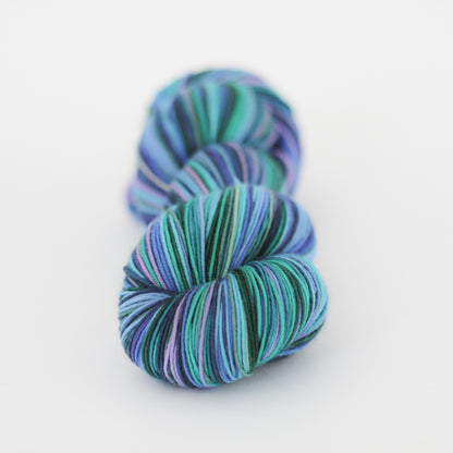 Azurite F green and purple self striping classic sock yarn from gauge dye works