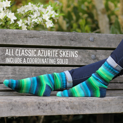 Azurite E green and orange self striping classic sock yarn from gauge dye works