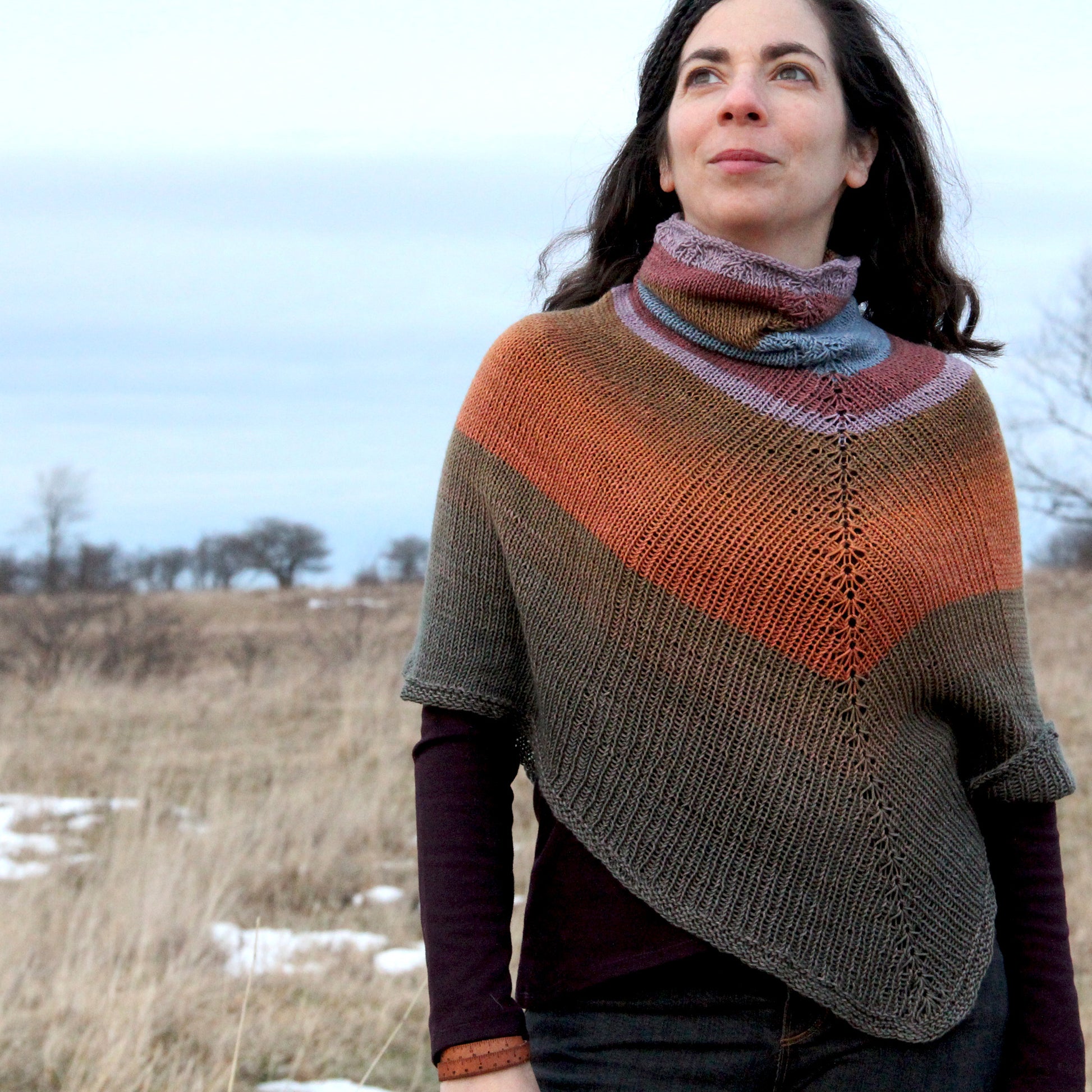 Flowsaic poncho by Laura Nelkin | Tesserae self patterning yarn by Gauge Dye Works | striping striped knitting wool